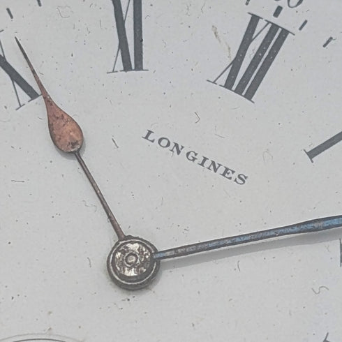 Antique Longines pocket watch, circa 1912, floral decoration, silver-sided hunter case, in good working order.