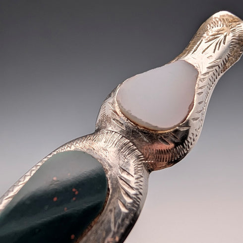 Antique British sterling silver brooch with three colored stones and a Scottish dark finish.