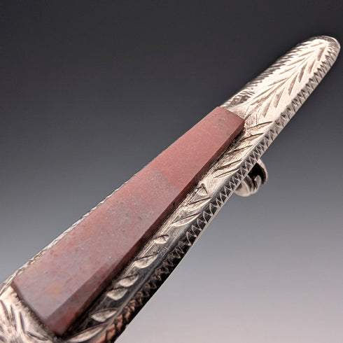 Antique British sterling silver brooch with three colored stones and a Scottish dark finish.