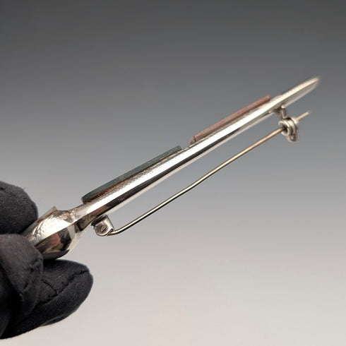 Antique British sterling silver brooch with three colored stones and a Scottish dark finish.