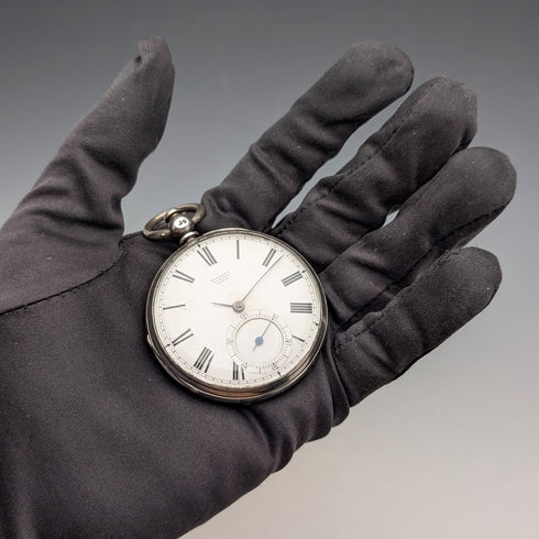 1864 British antique John Bennett key-wind pocket watch with open silver face, in good working order