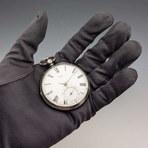 1864 British antique John Bennett key-wind pocket watch with open silver face, in good working order
