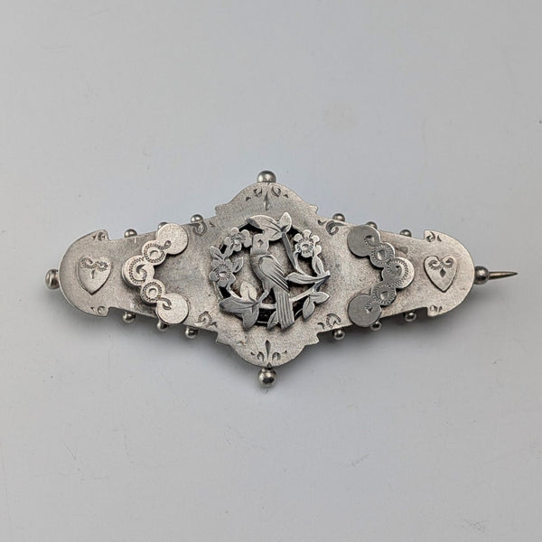 1892 British antique sterling silver brooch with engraved bird on tree