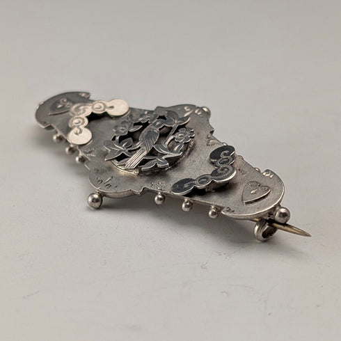 1892 British antique sterling silver brooch with engraved bird on tree