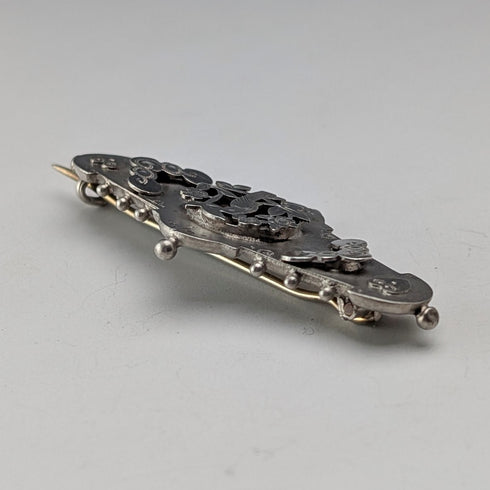 1892 British antique sterling silver brooch with engraved bird on tree