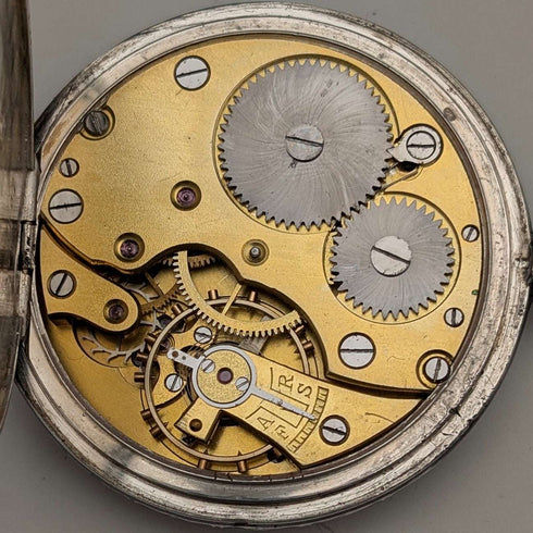 Antique, unsigned, Swiss-made pocket watch with silver case, niello decoration, open face, in good working order.