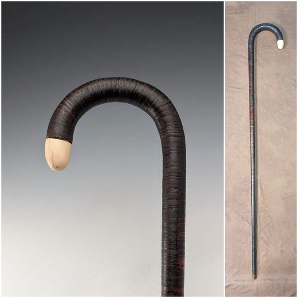 Antique British bone decorated curved handle leather wrapped iron shaft walking stick 89cm