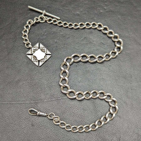 Antigüedad británica de alrededor de 1900, cadena Albert de plata pura (925), muy gruesa (73 g), con dije de plata pura de doble cara.