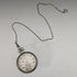 Reloj de bolsillo Cyma vintage, mecánico, caja plateada, en buen estado de funcionamiento, con cadena.