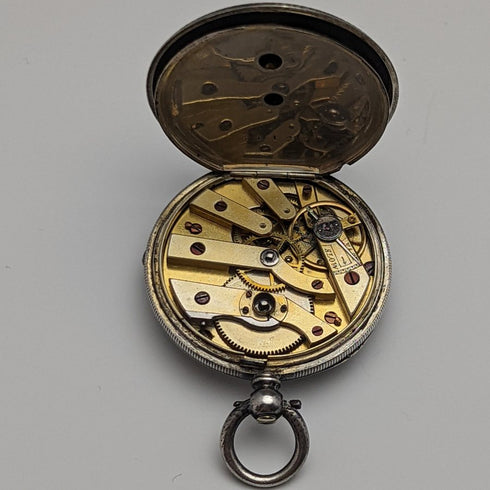 Antique Swiss made ladies' pocket watch works well floral engraving silver side case key winding