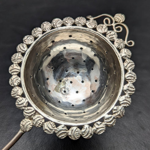 Vintage silver-plated tea strainer