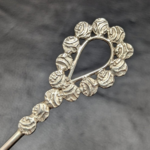 Vintage silver-plated tea strainer