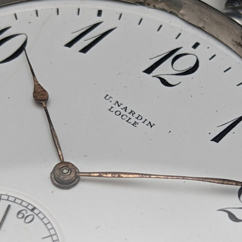 Around 1920 Antique Ulysse Nardin pocket watch silver case works well