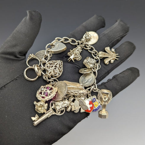 British vintage sterling silver charm bracelet 73g