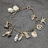 British vintage sterling silver charm bracelet 21g