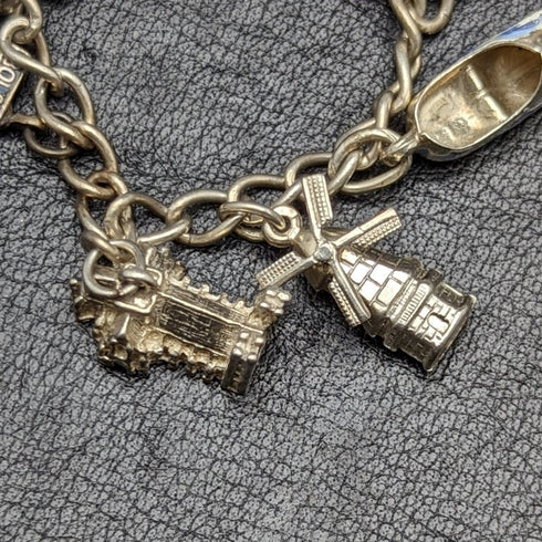 British vintage sterling silver charm bracelet 21g