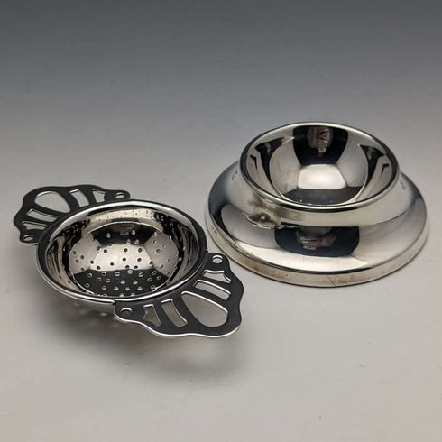 British vintage silver plate tea strainer