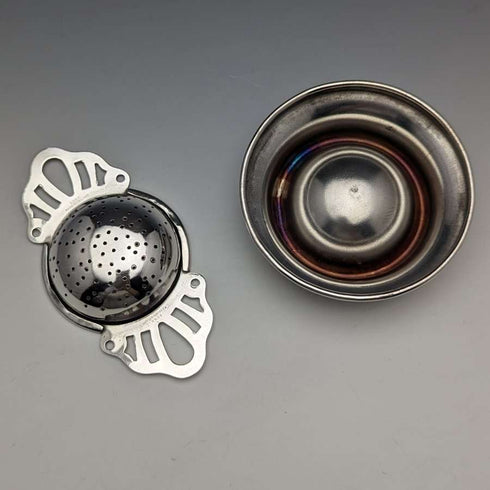 British vintage silver plate tea strainer