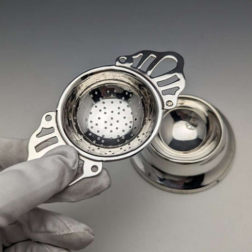 British vintage silver plate tea strainer