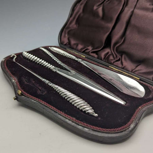 Circa 1892 British antique sterling silver handle accessory set in case
