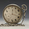 Reloj de bolsillo Cyma vintage, mecánico, caja plateada, en buen estado de funcionamiento, con cadena.