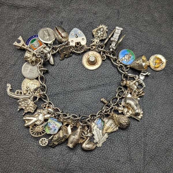British vintage sterling silver charm bracelet 69g