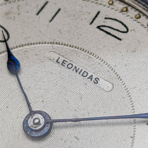 Swiss made antique Leonidas pocket watch flower sculpture silver side hunter case works well