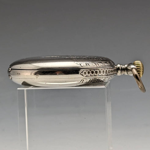 Swiss made antique Leonidas pocket watch flower sculpture silver side hunter case works well