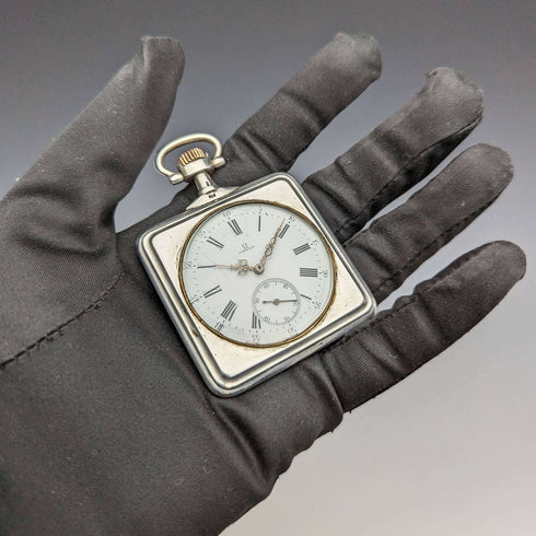 Around 1910 Antique Omega pocket watch with swan engraving square silver side case works well