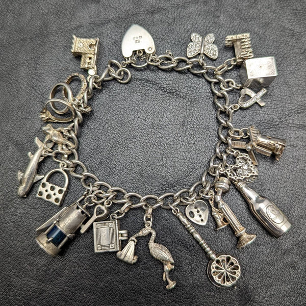 British vintage sterling silver charm bracelet 71g