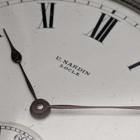 Around 1910 Antique Ulysse Nardin pocket watch Wild beast engraving Silver hunter case Works well